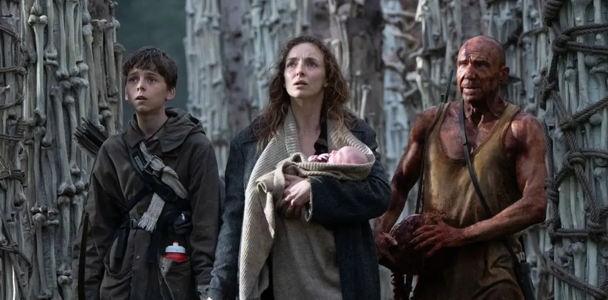 Link to 28 Years Later movie review Alfie Williams, Jodie Comer, and Ralph Fiennes play an unlikely trio in a zombie-infested world.