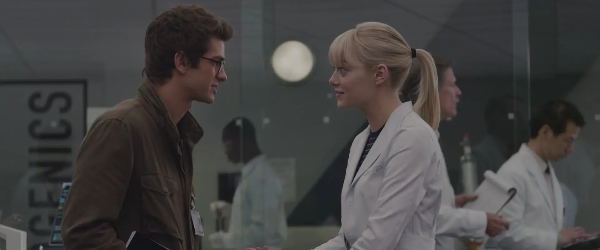 Peter Parker and Gwen Stacy talk in Oscorp Laboratories.