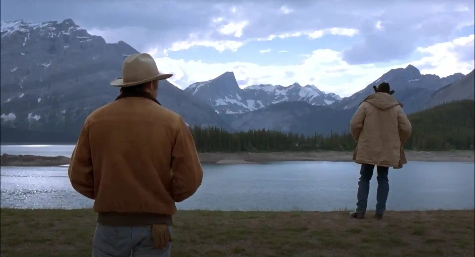 Two cowboys in an argument look at Brokeback Mountain.