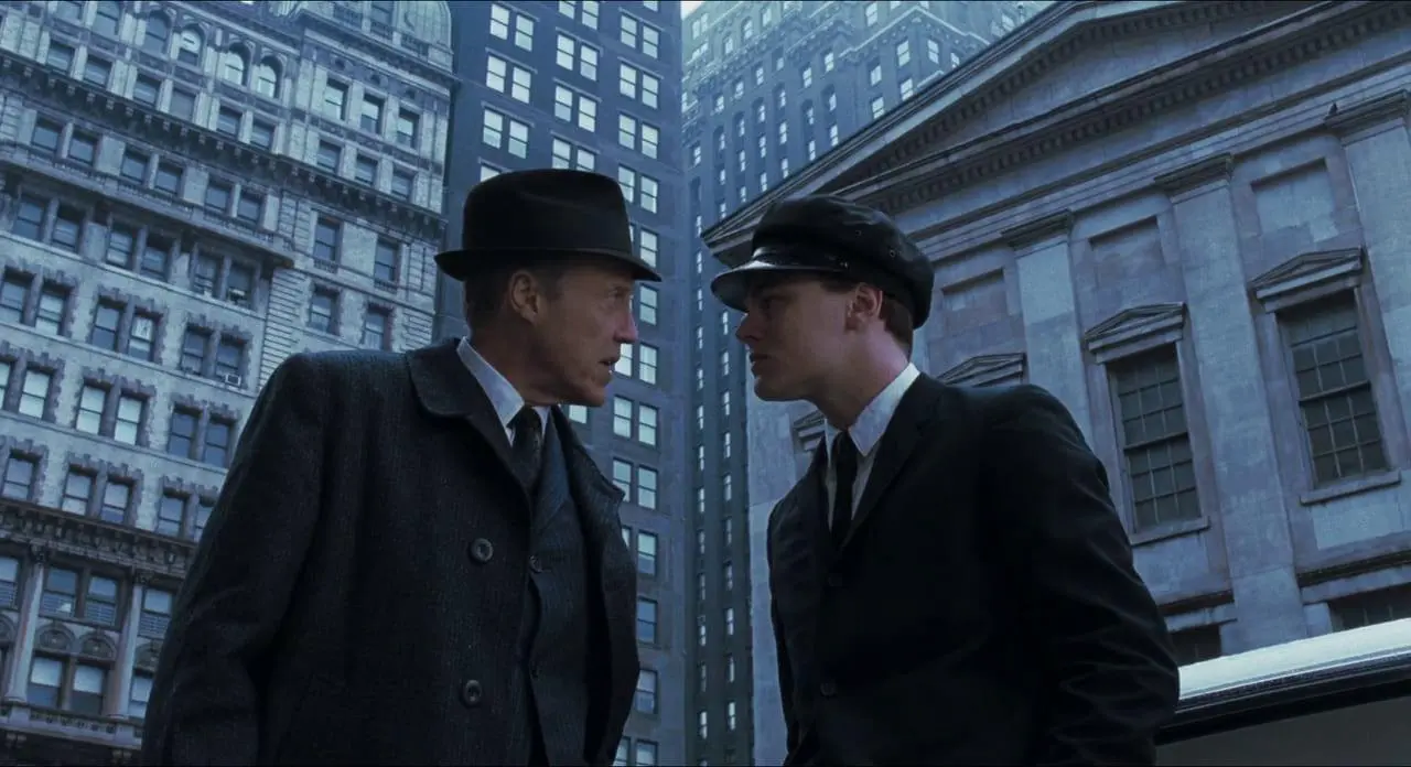 A father and son scheme in front of a bank building in New York City.