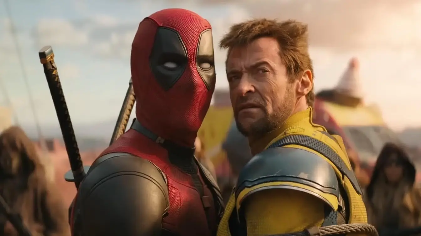 Deadpool and Wolverine stand next to each other.