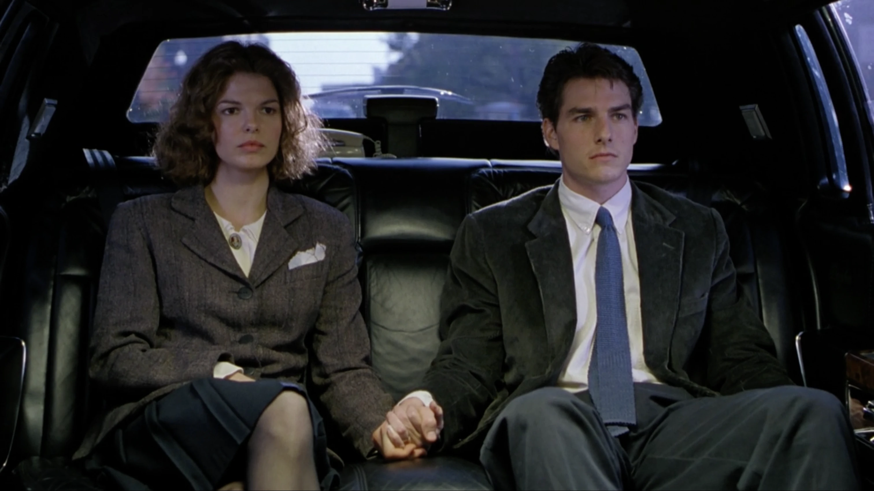 Link to The Firm movie review Tom Cruise and Jeanne Tripplehorn play a married couple moving to Memphis in a limo.