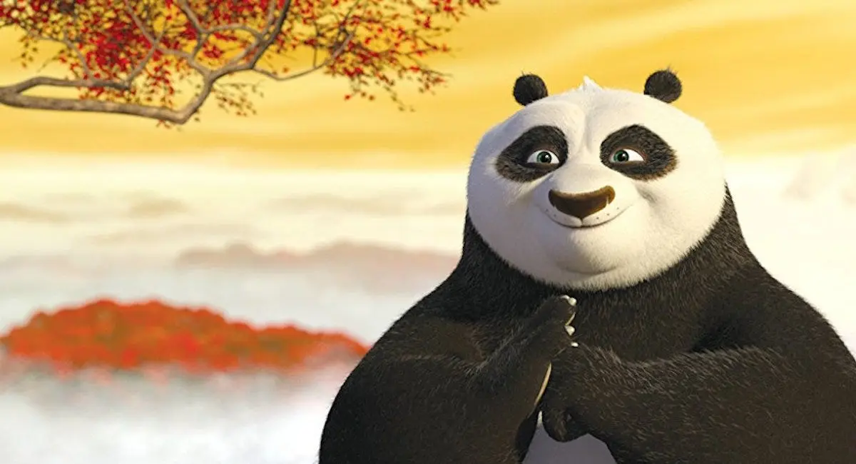 The panda, Po, salutes his Kung-Fu master.