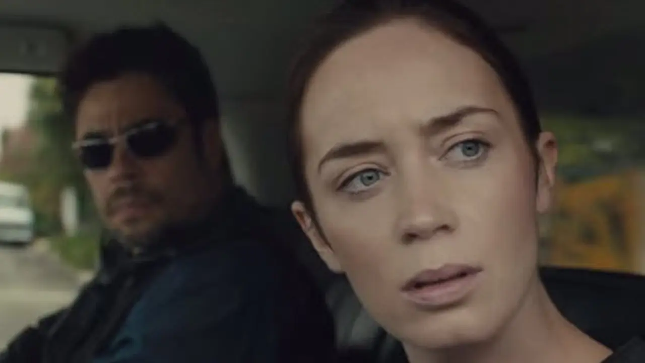 Emily Blunt looks out the car window in Mexico.