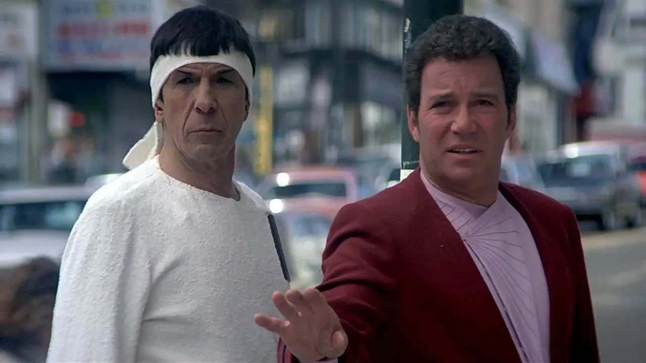 Admiral Kirk (William Shatner) and Captain Spock (Leonard Nimoy) stand confused on the streets of San Francisco.