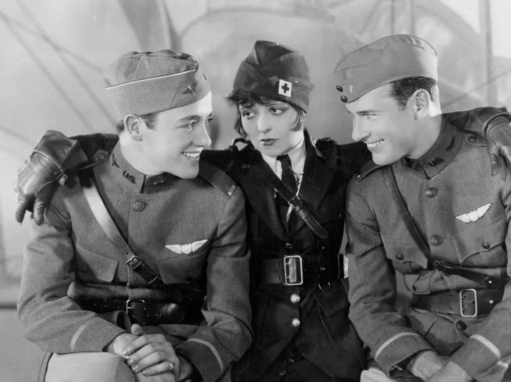 The three main characters of this fantastic 1927 film sit together on a plane.