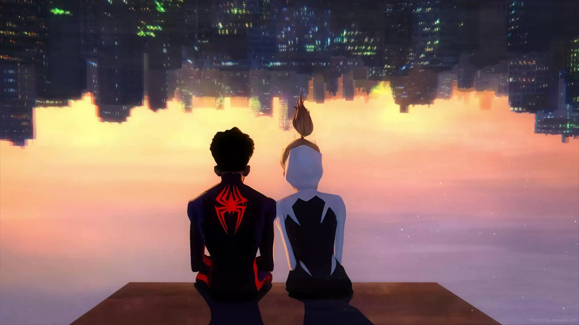 Mile Morales and Gwen Stacy look at the skyline, while sitting upside-down.