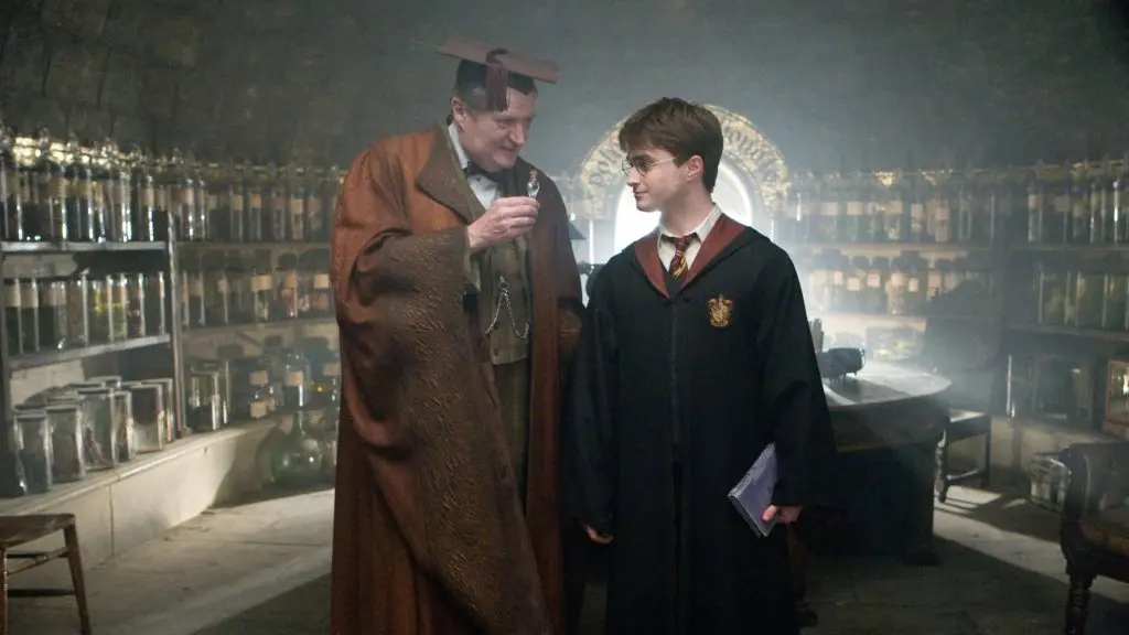 Professor Slughorn (Jim Broadbent) gives Harry (Daniel Radcliffe) a bottle of Felix Felicis, or Liquid Luck.